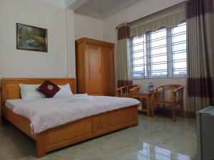 Phòng Giường Đôi Có Phòng Tắm Riêng (Double Room with Private Bathroom)