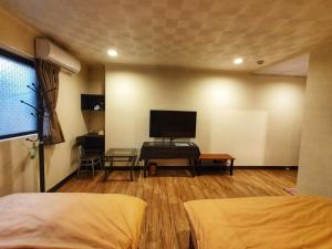 Phòng 3 Người Có Phòng Tắm (Triple Room with Bathroom)