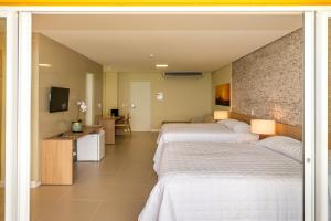 Family Room with Sea View room in Hotel Senac Barreira Roxa