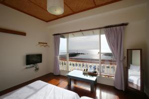 Phòng 4 Người Nhìn Ra Biển (Quadruple Room with Sea View)