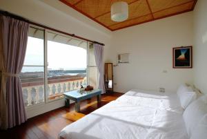 Phòng 4 Người Nhìn Ra Biển (Quadruple Room with Sea View)