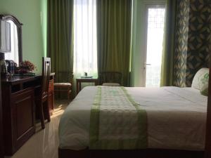 Phòng Deluxe Giường Đôi Có Ban Công (Deluxe Double Room with Balcony)