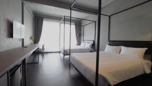 Phòng Hai Giường Đơn Loại Sang (Deluxe Twin Room)
