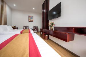 Phòng 4 người có ban công (Quadruple Room with Balcony)