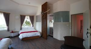 Phòng Deluxe 4 Người (Deluxe Quadruple Room)