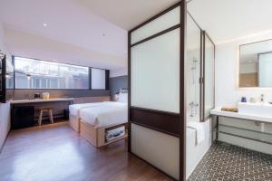 Phòng Hai Giường Đơn Loại Sang (Deluxe Twin Room)
