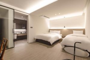 Phòng Hai Giường Đơn Loại Sang (Deluxe Twin Room)