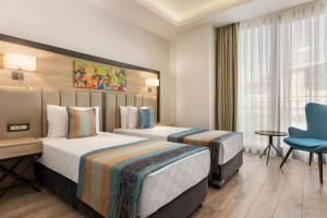 Twin Room - Non-Smoking room in Ramada Encore By Wyndham Istanbul Basin Express