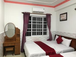 Phòng Deluxe Có 2 Giường Cỡ Queen (Deluxe Queen Room with Two Queen Beds)