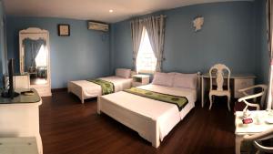 Phòng Giường đôi Deluxe (2 Người lớn + 1 Trẻ em) (Deluxe Double Room (2 Adults + 1 Child))