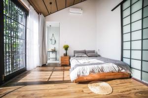 Phòng Có Giường Cỡ Queen Nhìn Ra Vườn (Queen Room with Garden View)