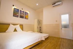 Phòng 3 Người Có Phòng Tắm Riêng (Triple Room with Private Bathroom)