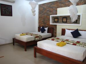 Phòng 4 người nhìn ra vườn (Quadruple Room with Garden View)