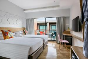 Phòng Loại Sang Hai Giường Đơn Có Ban Công (Deluxe Balcony Twin)