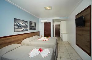 Quadruple Room with Garden View room in Moriah Natal Beach Hotel