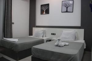 Twin Room with Private Bathroom room in Azar Boutique Hotel