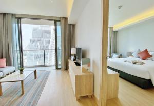 Deluxe One-Bedroom Apartment room in Oakwood Suites Bangkok - SHA Certified