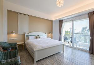 Phòng Deluxe Giường Đôi Với Ban Công và Tầm Nhìn Ra Biển (Deluxe Double Room with Balcony and Sea View)