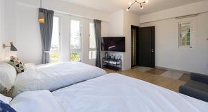 Phòng Bốn Người Có Phòng Tắm Riêng (Quadruple Room with Private Bathroom)