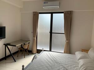 Phòng Giường Đôi Với Phòng Tắm Chung (Double Room with Shared Bathroom)