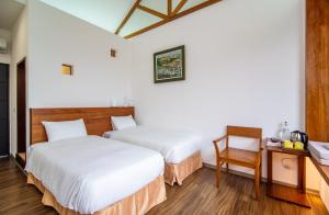 Phòng Giường Đôi/2 Giường Đơn Có Phòng Tắm Riêng (Double or Twin Room with Private Bathroom)