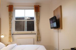 Double Room with Shared Bathroom room in Greenleafe Hotel