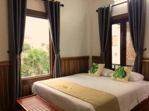 Phòng Có Giường Cỡ Queen Nhìn Ra Hồ Bơi (Queen Room with Pool View)