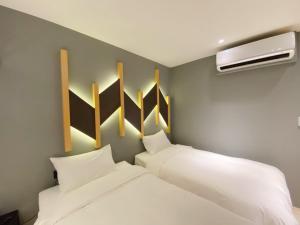 Phòng Tiết kiệm có 2 giường đơn (không có cửa sổ) (Economy Twin Room (no window))