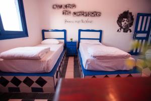 Triple Room with Sea View room in Jimi Hendrix Hotel