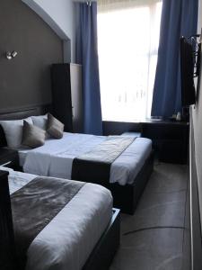 Triple Room room in Belfort Hotel