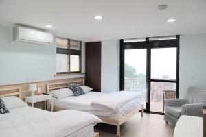 Phòng 4 Người Nhìn Ra Biển (Quadruple Room with Sea View)