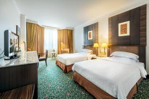 Premier Double or Twin Room room in Ramada by Wyndham Bangkok Chaophya Park