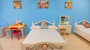 Phòng 4 Người Có Ban Công (Quadruple Room with Balcony)