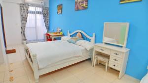 Phòng 4 Người Có Ban Công (Quadruple Room with Balcony)