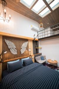 Phòng Deluxe Có 2 Giường Cỡ Queen (Deluxe Queen Room with Two Queen Beds)