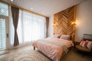 Phòng Deluxe Giường Đôi Có Ban Công (Deluxe Double Room with Balcony)