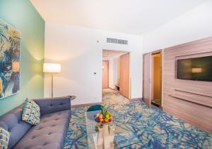Junior Suite room in MENA Plaza Hotel Albarsha
