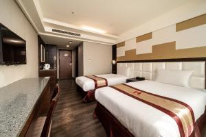 Phòng Hai Giường Đơn Loại Sang (Deluxe Twin Room)