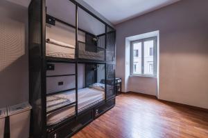 Bed in 4-Bed Mixed Dormitory Room with En suite Bathroom  room in YellowSquare Rome