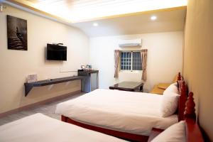 Phòng 4 người có phòng tắm (Quadruple Room with Bathroom)