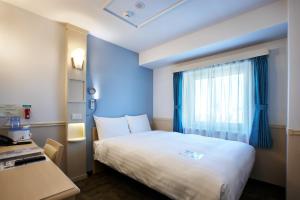 Phòng Đôi Phổ Thông Hướng Thành Phố (Economy City View Double Room)