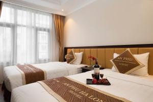 Phòng Hai Giường Đơn Loại Sang (Deluxe Twin Room)