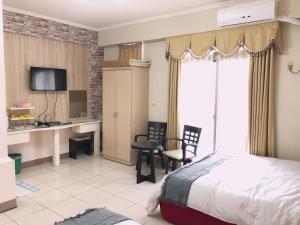 Phòng Deluxe 4 Người (Deluxe Quadruple Room)