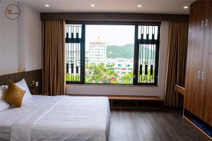 Phòng Deluxe Có 2 Giường Cỡ Queen (Deluxe Queen Room with Two Queen Beds)