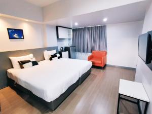 Phòng Hai Giường Đơn Loại Sang (Deluxe Twin Room)