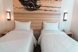 Phòng Hai Giường Đơn Loại Sang (Deluxe Twin Room)