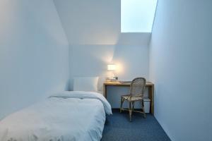 Phòng Đơn với Nhà vệ sinh Chung (Single Room with Shared Toilet)