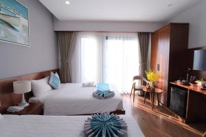 Phòng Hai Giường Đơn Loại Sang (Deluxe Twin Room)