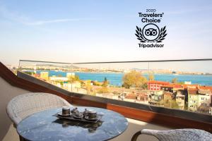 Superior Triple Room with Sea View room in Acra Hotel - Special Category