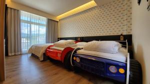 Phòng gia đình với phòng tắm riêng. (Family Room with Private Bathroom)
